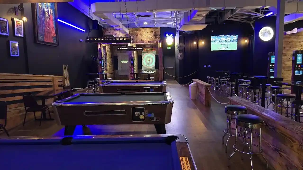 Photo of Cosmic Mayhem: Black Light Mini Golf and Bar axe throwing activities in San Antonio