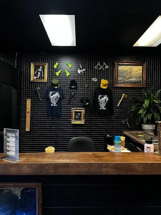 Interior view of The Axe Lair axe throwing facility in Los Angeles