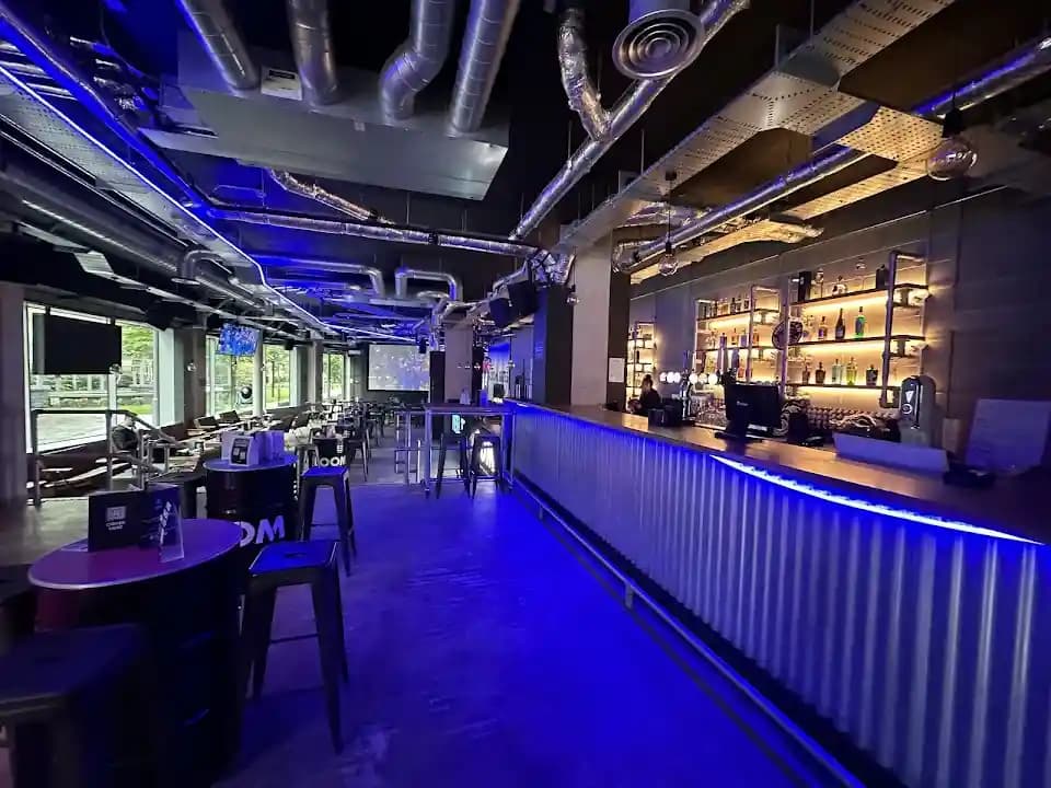 Interior view of Boom Battle Bar Aldgate axe throwing facility in London