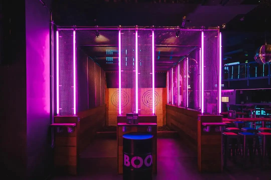Interior view of Boom Battle Bar Manchester Printworks axe throwing facility in Manchester