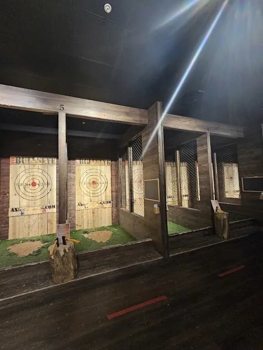 Interior view of BullsEye Axe Lounge X Rage Room axe throwing facility in Chicago