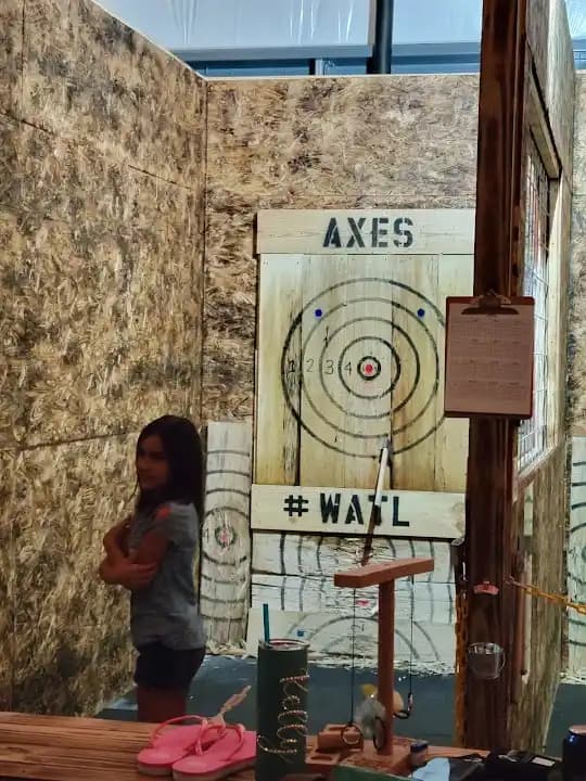 Interior view of Slinging Axes axe throwing facility in Houston