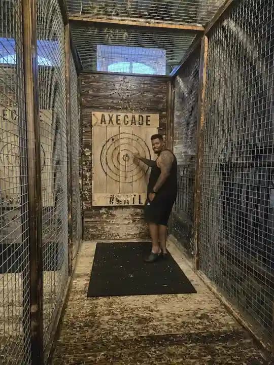 Photo of Axecade axe throwing activities in Houston
