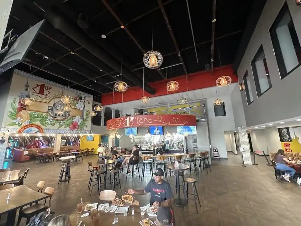 axe throwing experience at 1UP Entertainment + Social located in Tampa